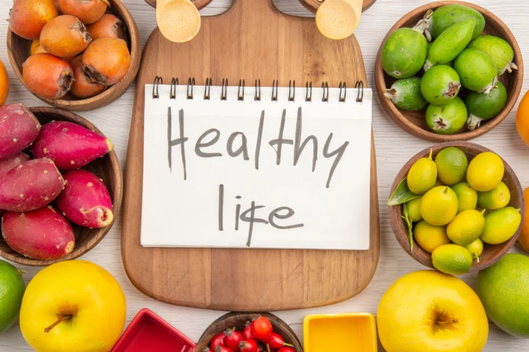 top-view-different-fresh-fruits-inside-plates-with-healthy-life-writing-white-background-tropical-ripe-color-diet-mellow-exotic (1)